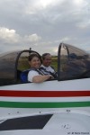 Amy and Luca strapped in and ready to fly in the CAP10C
