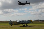 Lancaster over a German Messerschmitt